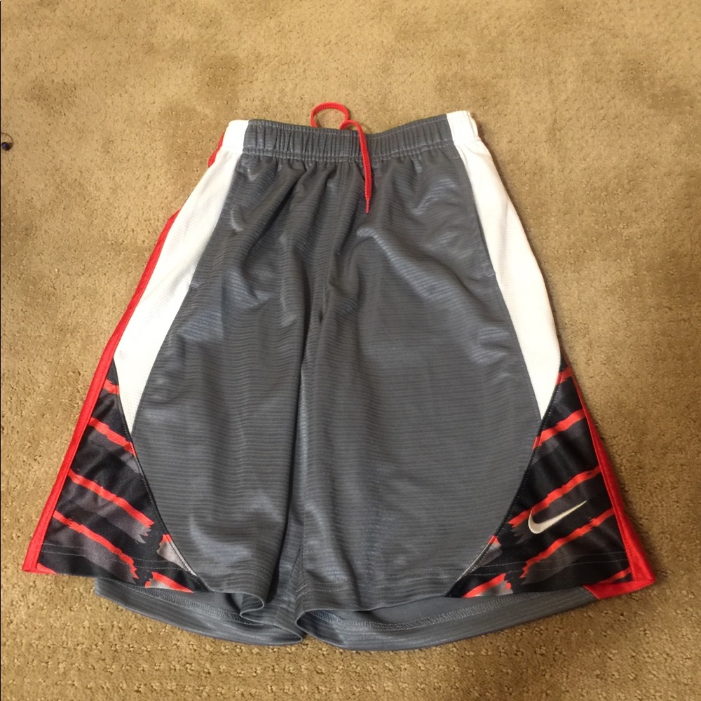 Gray red and white nike basketball shorts